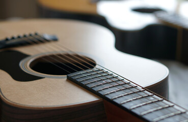 Fototapeta premium acoustic guitar, Used to play music and notes, for sing a song, macro abstract