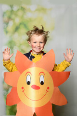 child in a sun costume