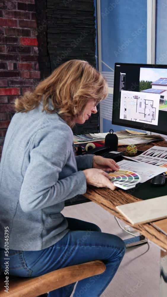 Aufkleber side view of real estate designer working on computer