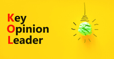 KOL key opinion leader symbol. Concept words KOL key opinion leader on yellow paper on a beautiful...