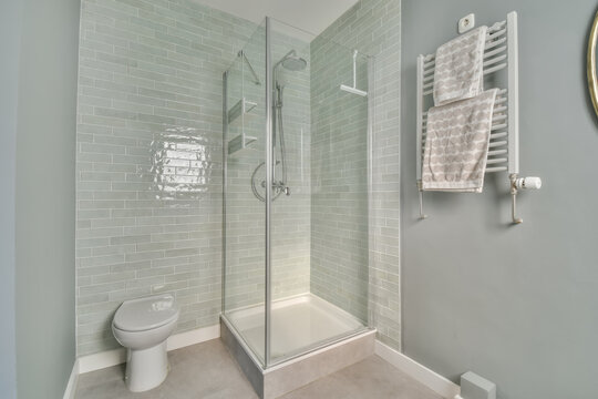 Interior of white bathroom with shower