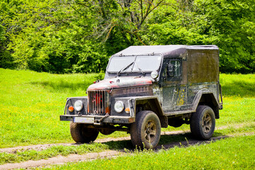 Fototapeta premium Old military mobile vehicle unit pass on on road in Kakheti, Georgia