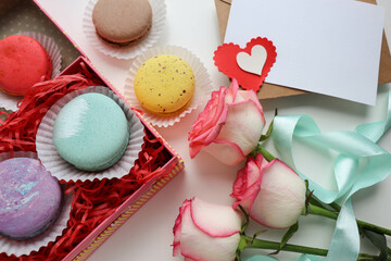 gift concept for valentine's day. gift box with macarons and red heart