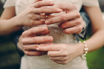 bride and groom hands