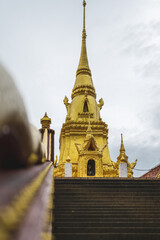 Fototapeta na wymiar Stairs leading up to a Pagoda or Stupa in Koh Samui, Thailand