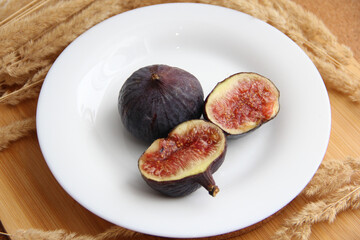 fresh figs on a wooden table