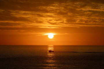 Naklejka na ściany i meble maine sunrise with fishing boat