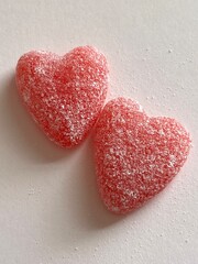 cinnamon candy hearts, red and sugary, close up for valentines day