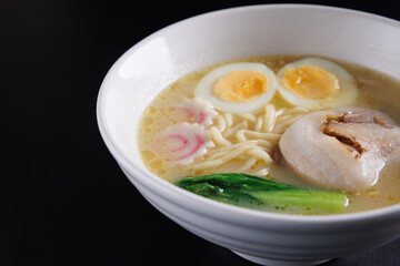 Ramen Japanese noodle isolated in black background