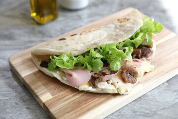 Italian cuisine , Piadina with Italian ham and cheese