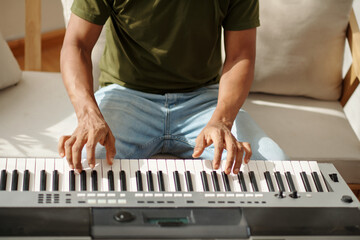 Cropped image of composer working on new song for client - obrazy, fototapety, plakaty