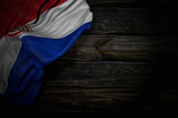 wonderful national holiday flag 3d illustration. - dark photo of Paraguay flag with large folds on old wood with empty place for your text