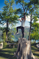 balancing on one leg on trunk. The karate crane © David