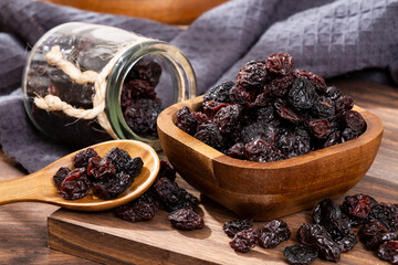 Healthy Food - Nuts Dehydrated Grapes; Photo On Wooden Background