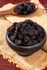 Healthy Food - Nuts Dehydrated Grapes; Photo On Wooden Background