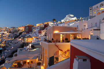 View of the city of Fira in the evening backlight. Santorini, Greece