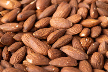 Close up shot of almond nuts. Freshly harvested almond, background of tasty nuts