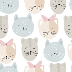Seamless pattern with funny cat heads on white background for child