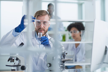 In a Modern Laboratory Research Scientist Conducts Experiments