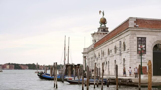 Punta della Dogana, Fortuna Statue. Iconic symbol of Venice, Italy. Historic landmark in Italy. Summer tourism travel destination in Europe