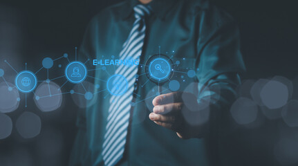 bussinessman holding magnifier glass focus to E-learning, E-learning Education Internet Technology Webinar Online Courses concept.