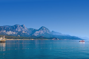 Beautiful view of the coastline of Kemer. Mountains and sea, Kemer beach, Turkey