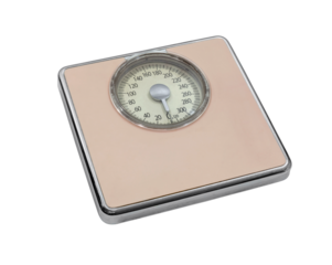 Vintage pink bathroom scale isolated with cut out background.