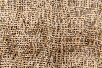 Cloth. The texture of the burlap fabric is close-up. Packaging material. Background Of Burlap Hessian Sacking