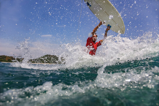 Surfer in sea,Â Sumbawa, Indonesia