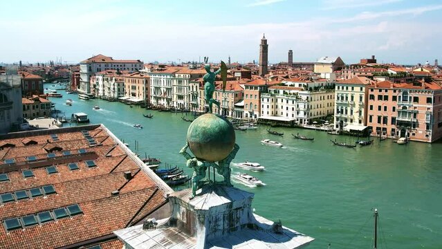 Venice drone 4k. Punta della Dogana, Fortuna Statue. Iconic symbol of Venice, Italy. Famous landmark. Romantic honeymoon, cruise ship destination in Europe. 