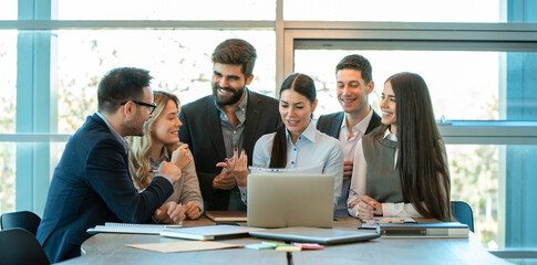 Group of confidence business people working together in the office.