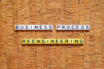 Business process reengieering - word concept on cubes, text