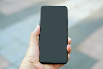 A hand was the mobile smart phones .