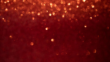 Fototapeta na wymiar Shiny red blurred background for holiday design, web banner. Christmas disfocus abstract sparkles, selective focus