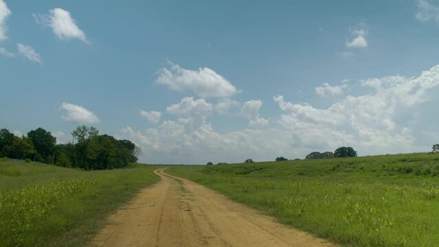 Long, Dirt Road on a Sunny Day
