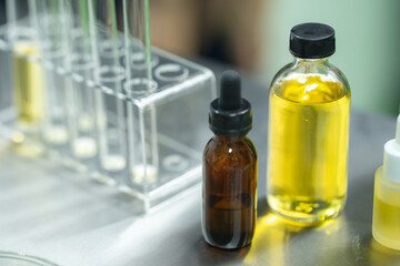 Researchers pouring hemp oil into a science glass tube, Chemist extracting cbd with rotavapor in laboratory, That will lead to the conceptual experiment of alternative medicine experimental