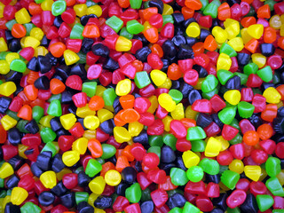 Closeup of a large quantity of gumdrop candies.