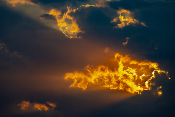 the expressive contrast of the clouds in the sky and sun. The nature and beauty of clouds