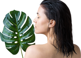 Beauty Woman with natural green palm leaf portrait. Fashion, beauty, make-up, cosmetics.