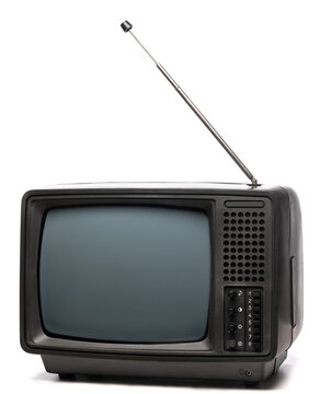 Old portable TV set on white background