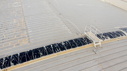 Aerial closeup of a sheet metal roof.