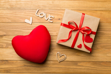 Valentines day gifts on color background, top view