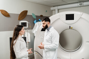CT scan doctors are discussing x-ray of computed tomography of brains of patient. Computed...