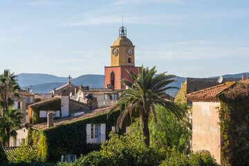 Fototapeta na wymiar Scenic view of Saint Tropez in summer colors against blue sky