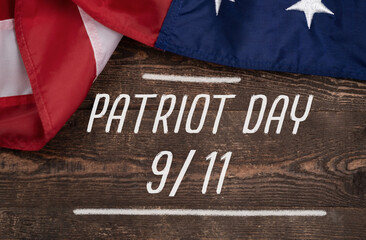 Fototapeta na wymiar Patriot Day. 9 11 USA Never Forget. Text and America flag on black. Remember September 11.