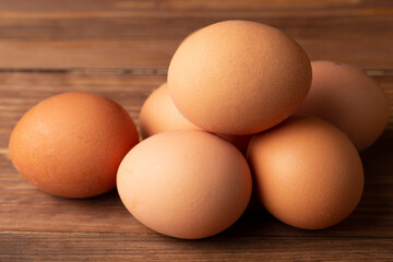 Brown eggs on a dark background.Sale of eggs.Fresh eggs.