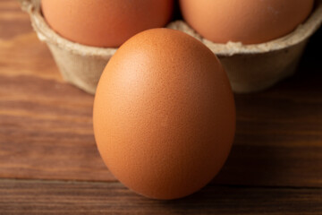 Brown eggs on a dark background.Sale of eggs.Fresh eggs.