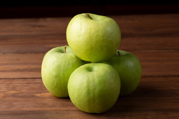 Green apples, Granny Smith, on a dark background.Fresh apples for sale.