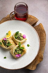 delicious pancakes with filling on a plate
