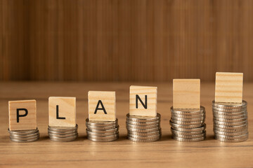 The concept of planning and budget allocation. Wooden cubes with the word 